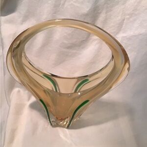 Mid-century, modern influence glass blown with occlusions and bubbles.